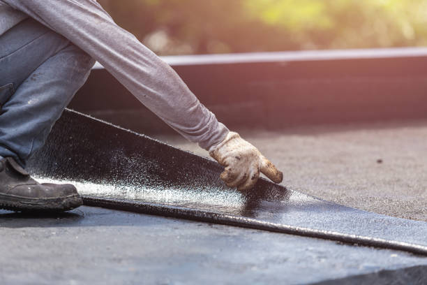 Professional Basement Waterproofing technician working in Jemison, AL